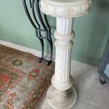 White marble column – sculpted base