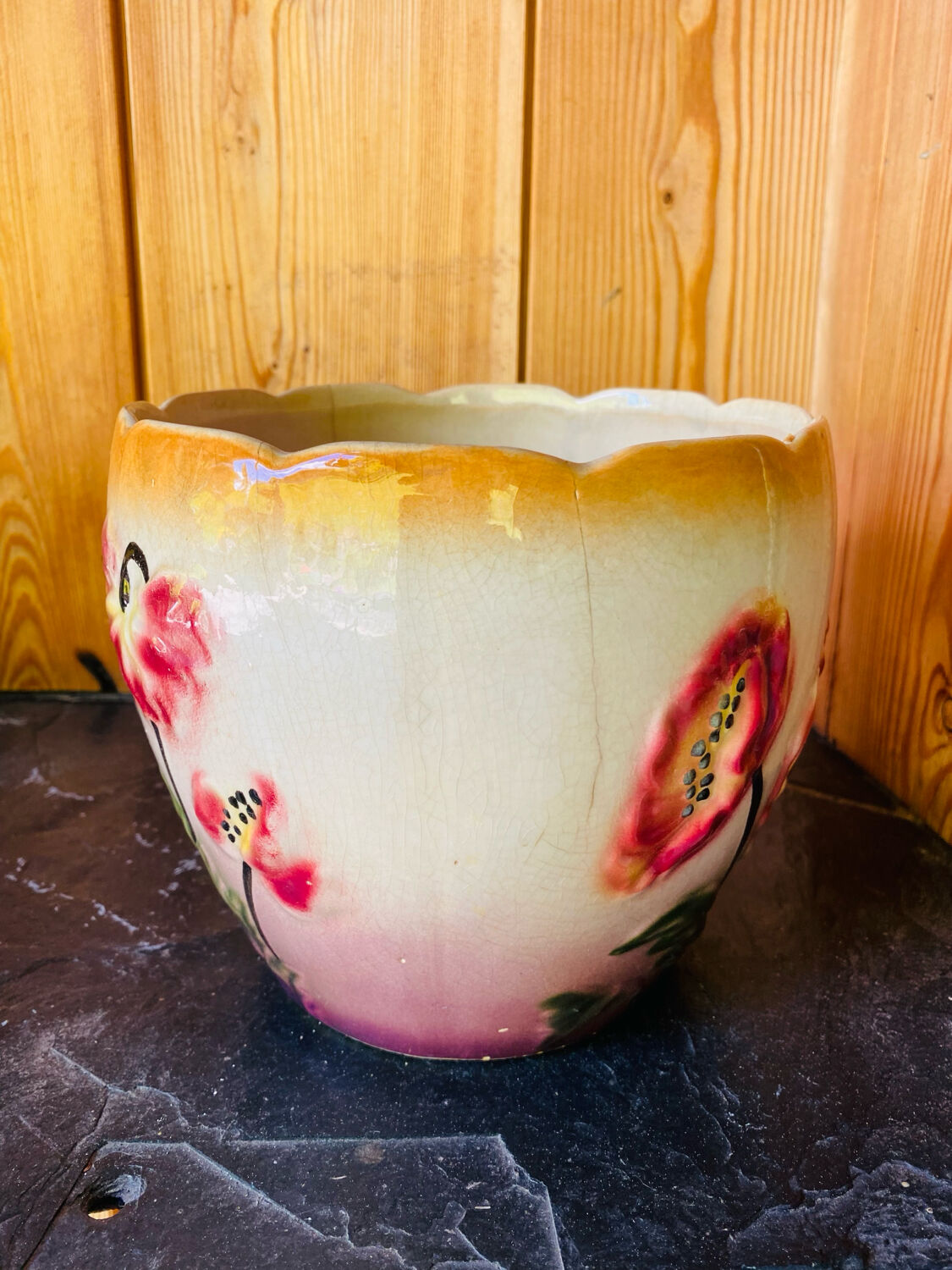 Earthenware cache pot with slip decoration.