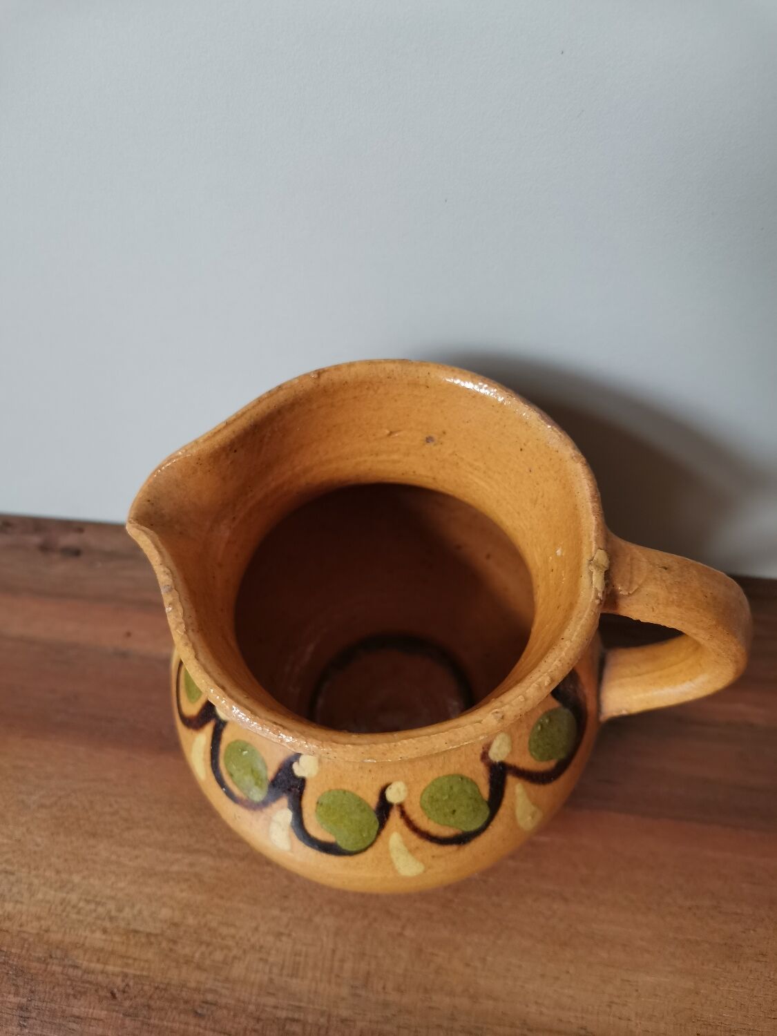 Hand-painted rustic enamelled vintage pitcher