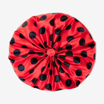 Red and black round silk cushion