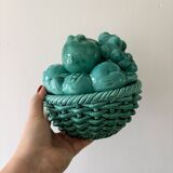 Vintage green earthenware plate/basket with fruit decorations.