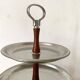 Vintage tiered display stand, stainless steel rotating server Alessi Fratelli