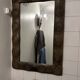 Wall mirror in carved wood (spiral patterns)