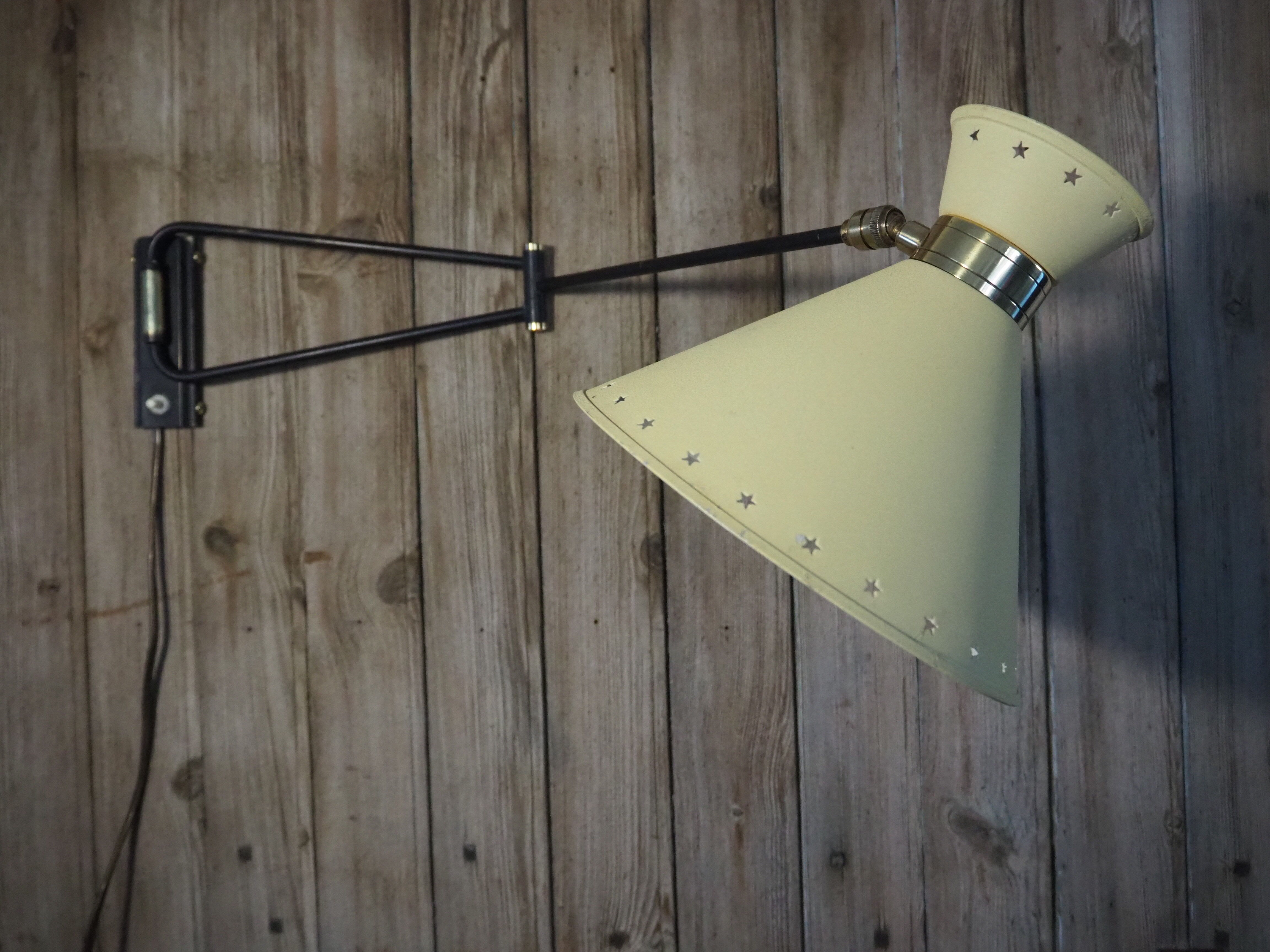 Diabolo articulated wall lamp by designer René Mathieu