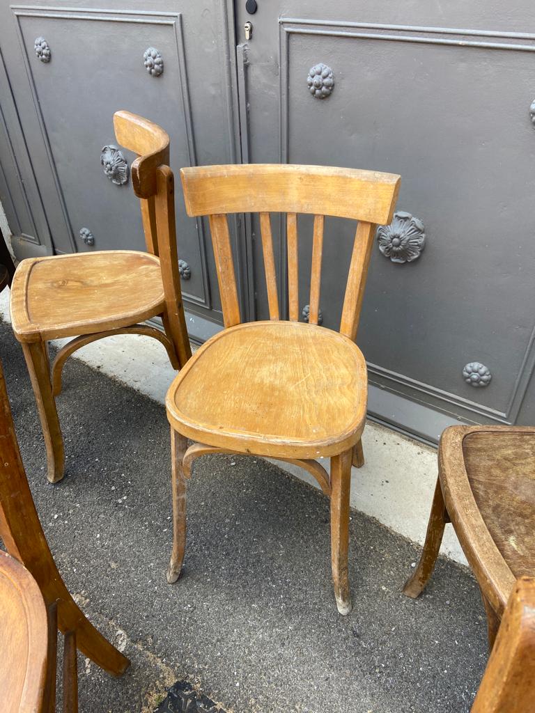 Set of 10 mismatched curved wood bistro chairs from the 1950s-60s