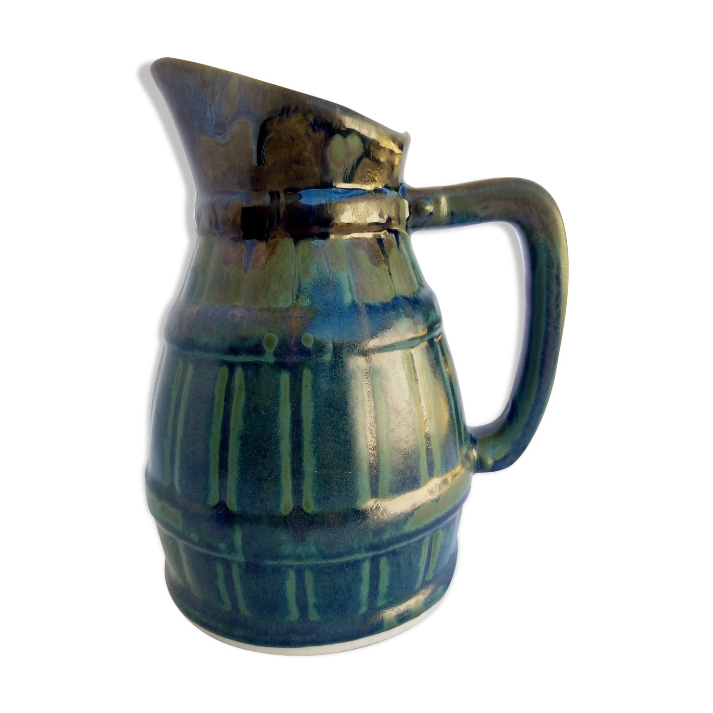 Black, blue, green pitcher