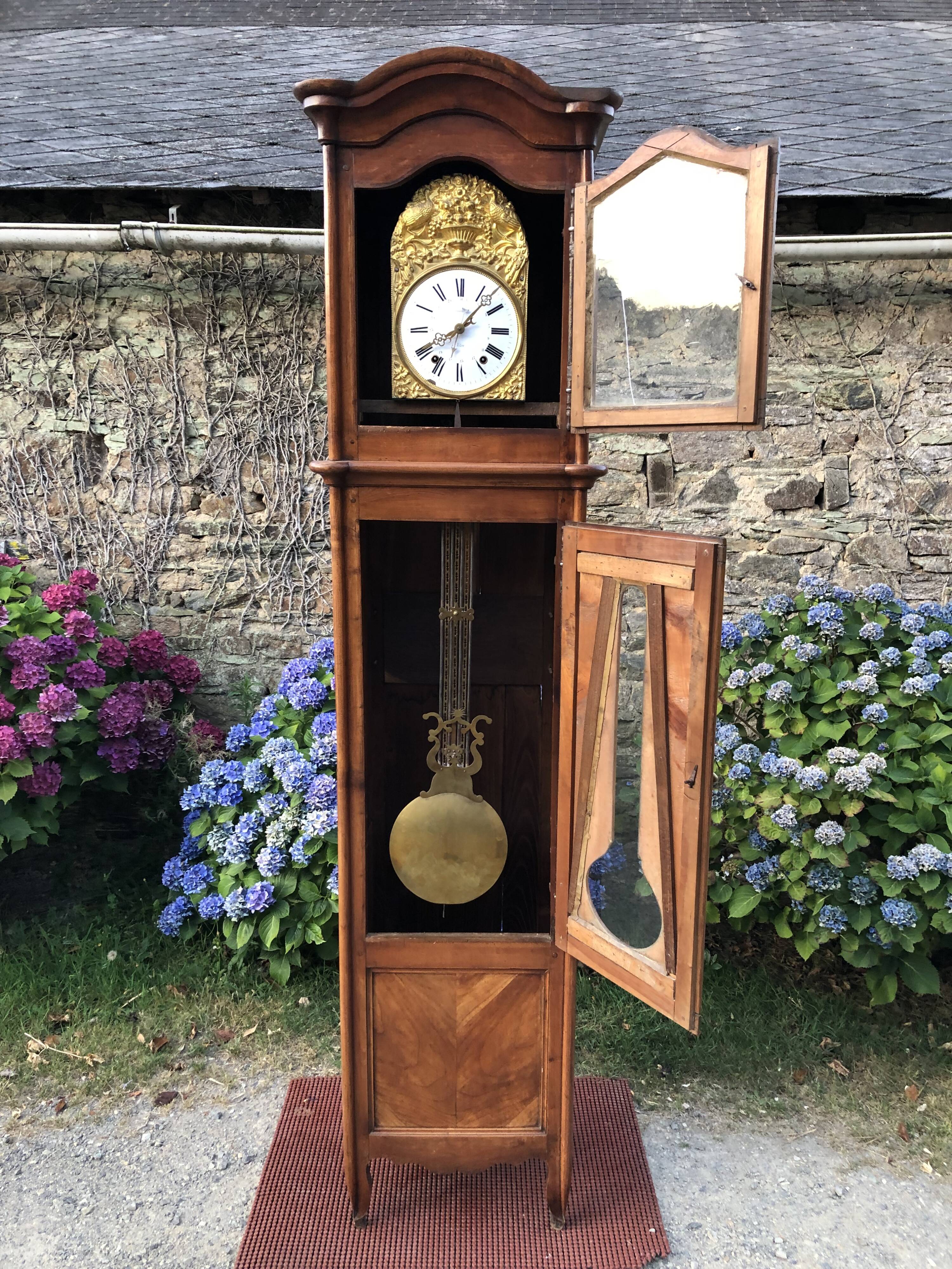 Comtoise clock in cherry style Louis XV period 19th region Fougères.