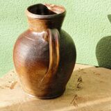 Large stoneware jug with a family name pattern, 1912