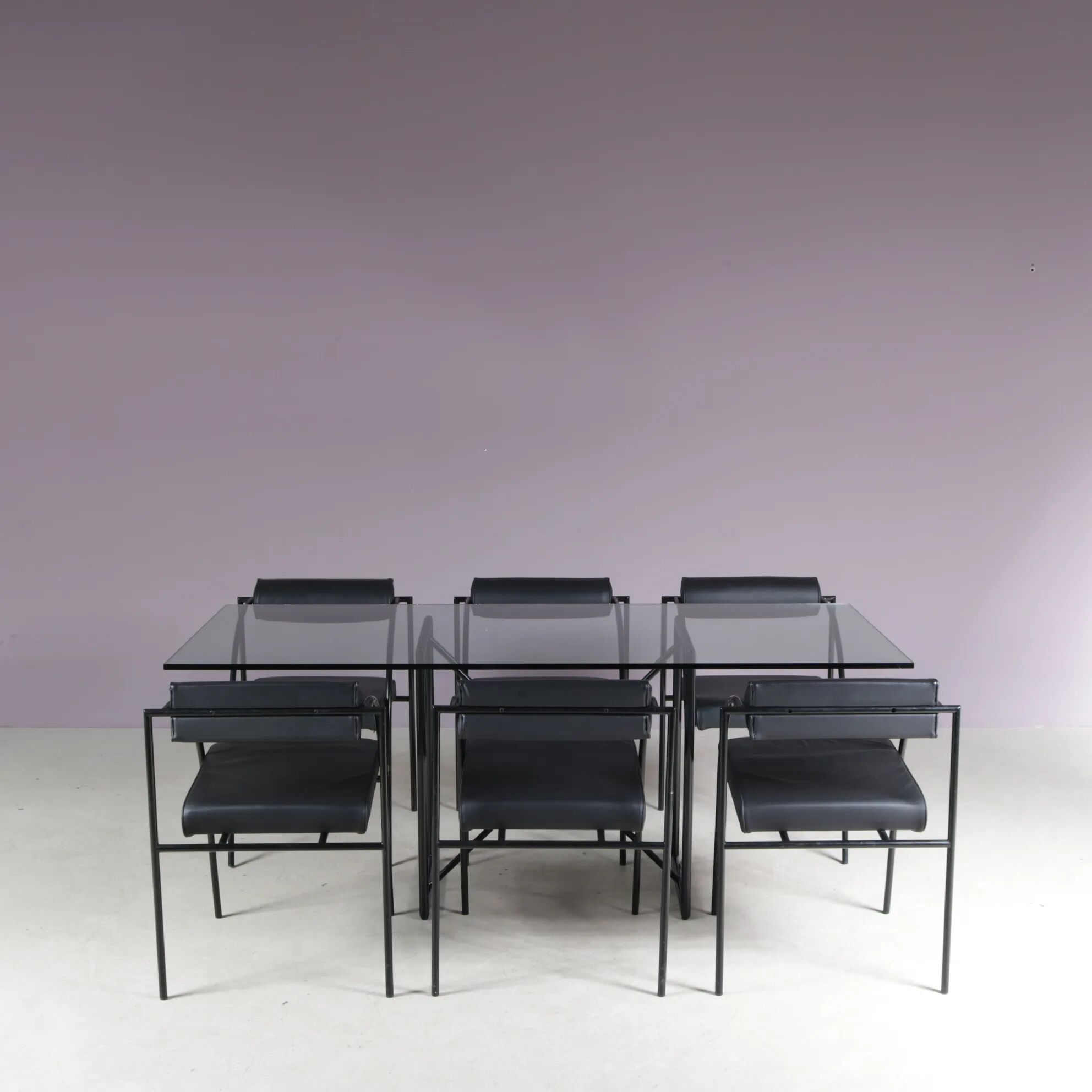1980s “Tokio” dining table with six “Vienna” chairs by Rodney Kinsman for Bieffeplast, Italy