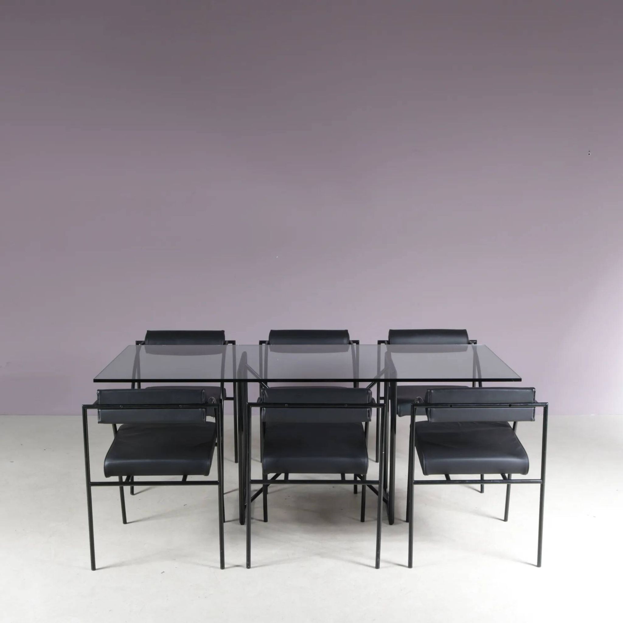 1980s “Tokio” dining table with six “Vienna” chairs by Rodney Kinsman for Bieffeplast, Italy