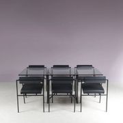 1980s “Tokio” dining table with six “Vienna” chairs by Rodney Kinsman for Bieffeplast, Italy