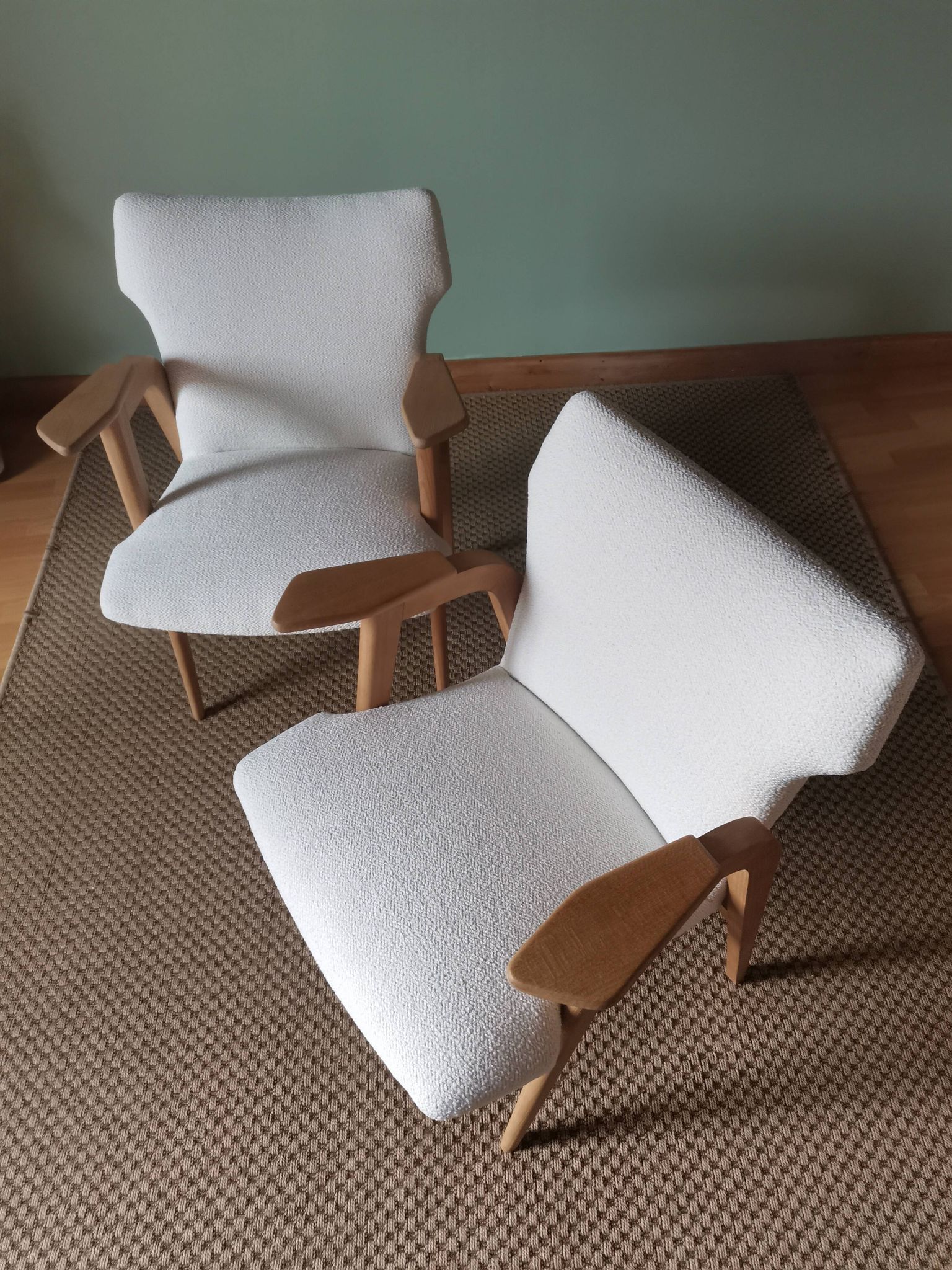 Scandinavian armchairs by Roger Landault in white.