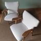 Scandinavian armchairs by Roger Landault in white.