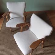 Scandinavian armchairs by Roger Landault in white.
