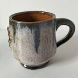 Fleur-de-lis glazed earthenware mug