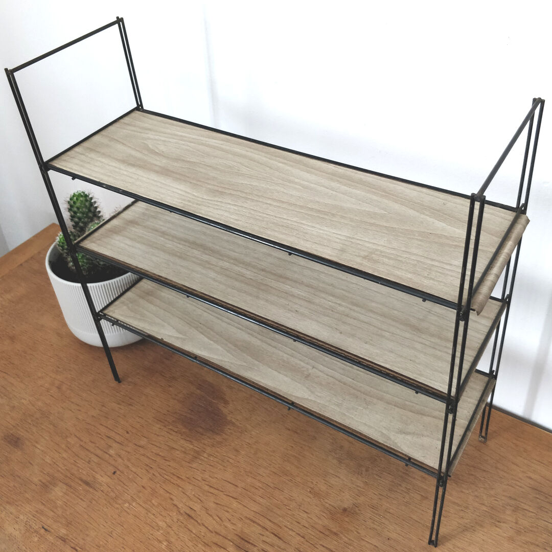 Metal wall thong shelf