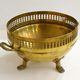 Planter on lion legs, made of golden metal
