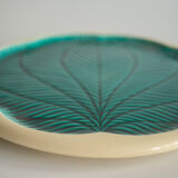 Green and off-white ceramic dish