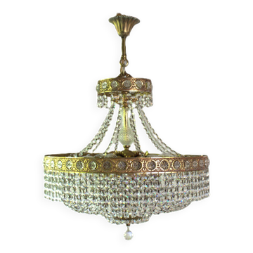 Antique castle style chandelier with tassels and floral details