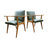 Pair of green Scandinavian armchairs with compass feet