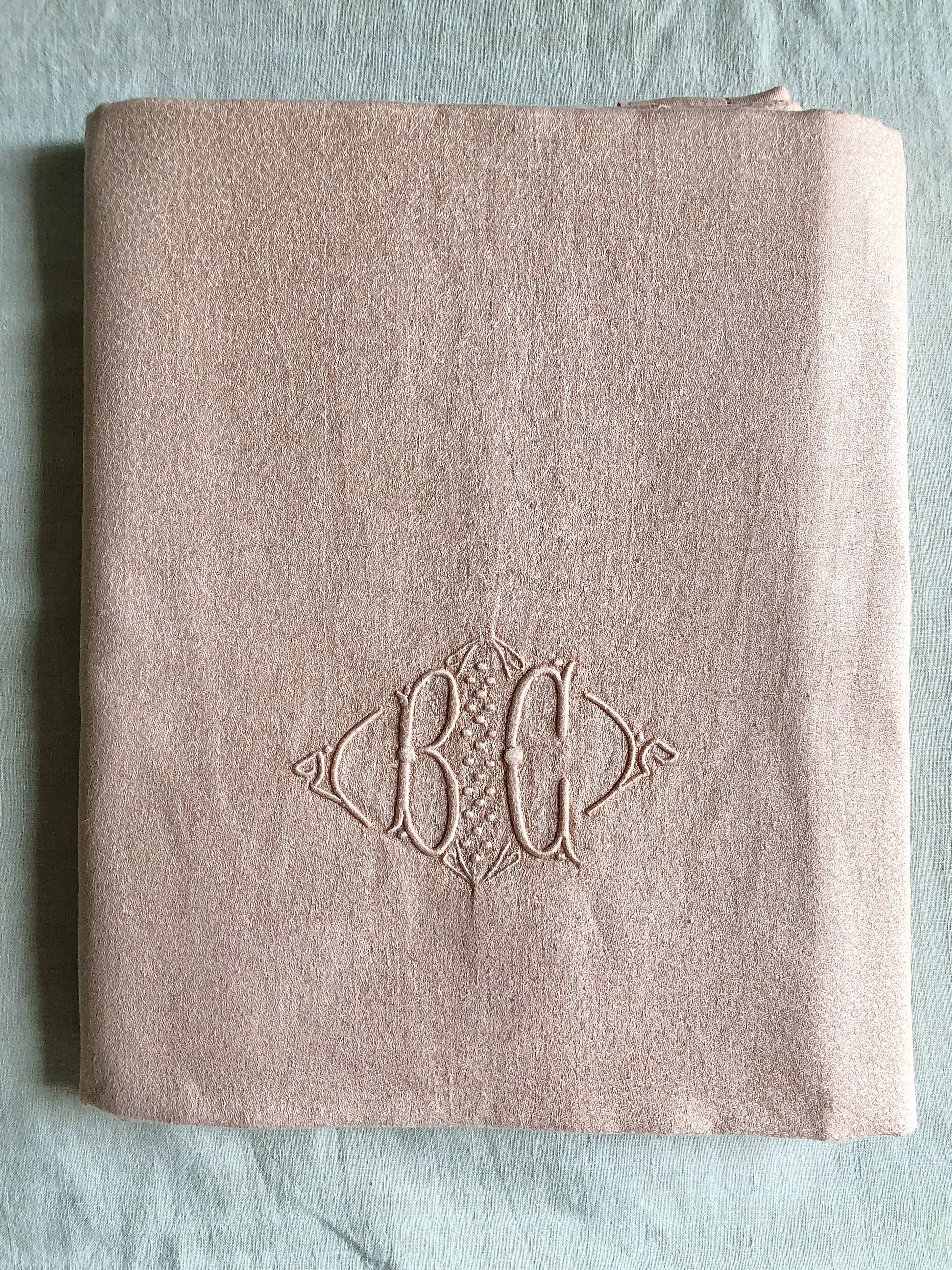 Old damsed tablecloth in linen and silk coral