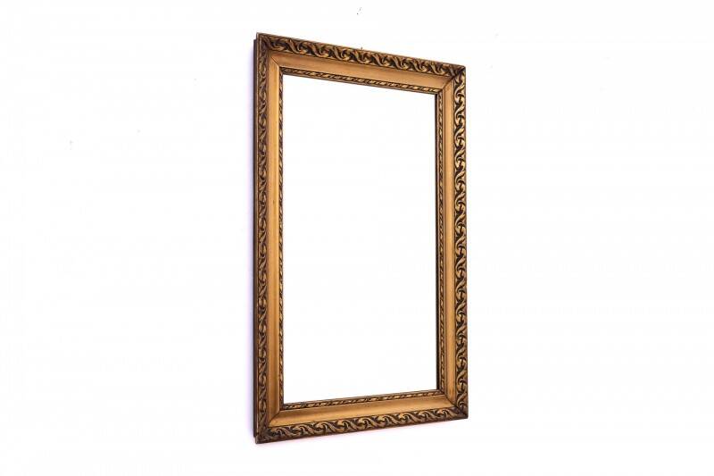 Mirror with a gold frame from the 1950s, France.