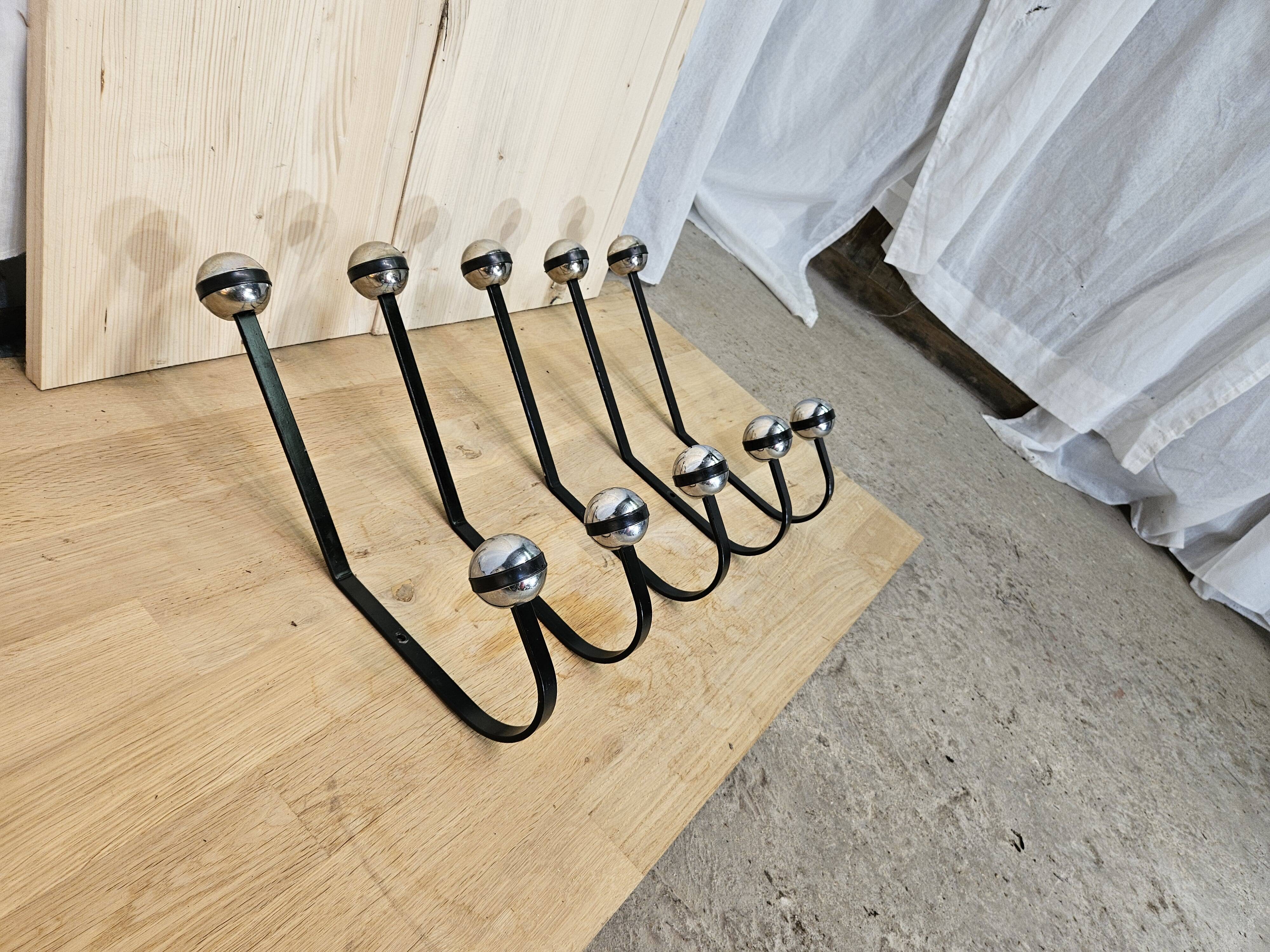 5 black and silver coat hooks from the 60s