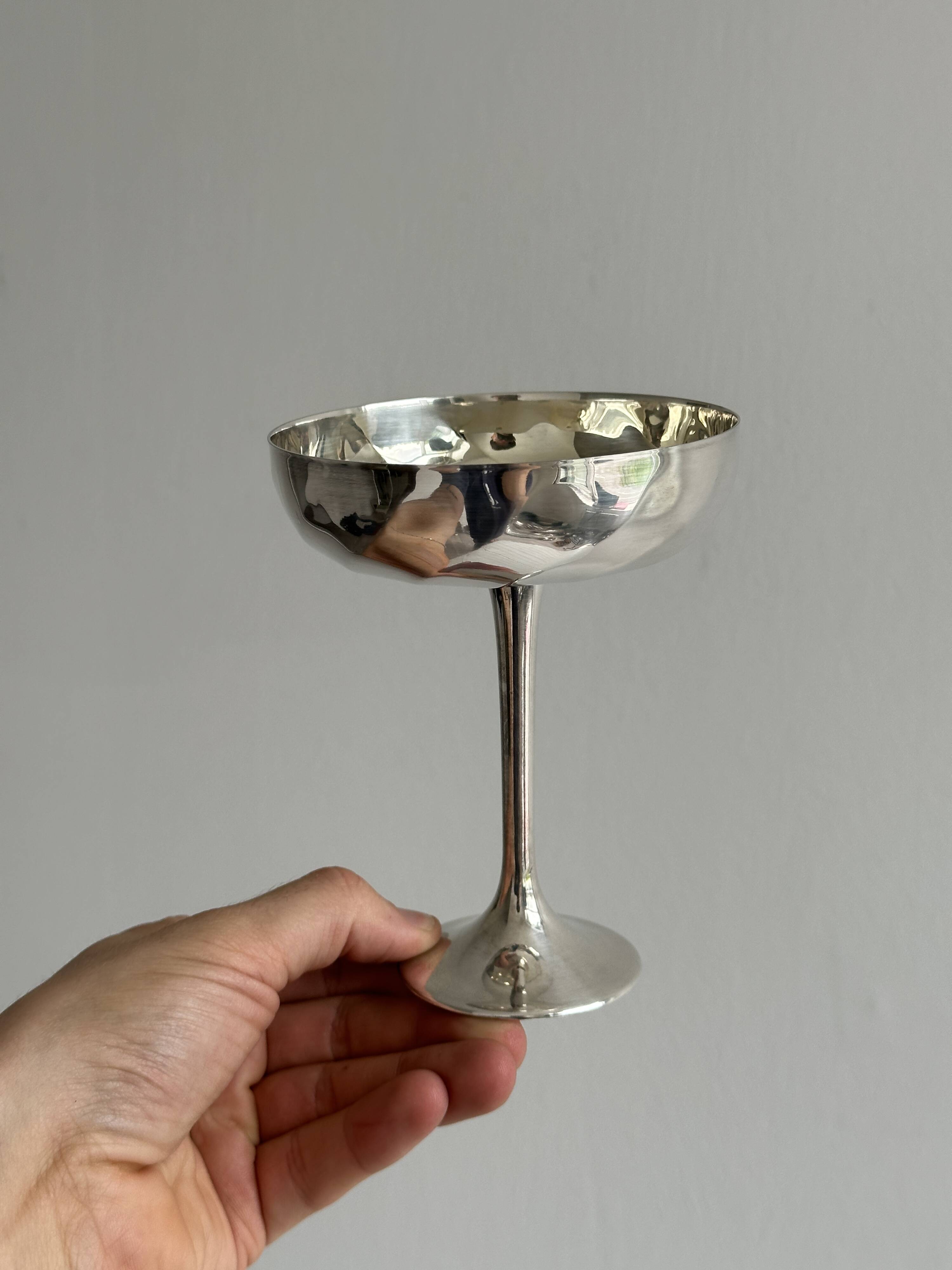 6 shiny metal footed bowls