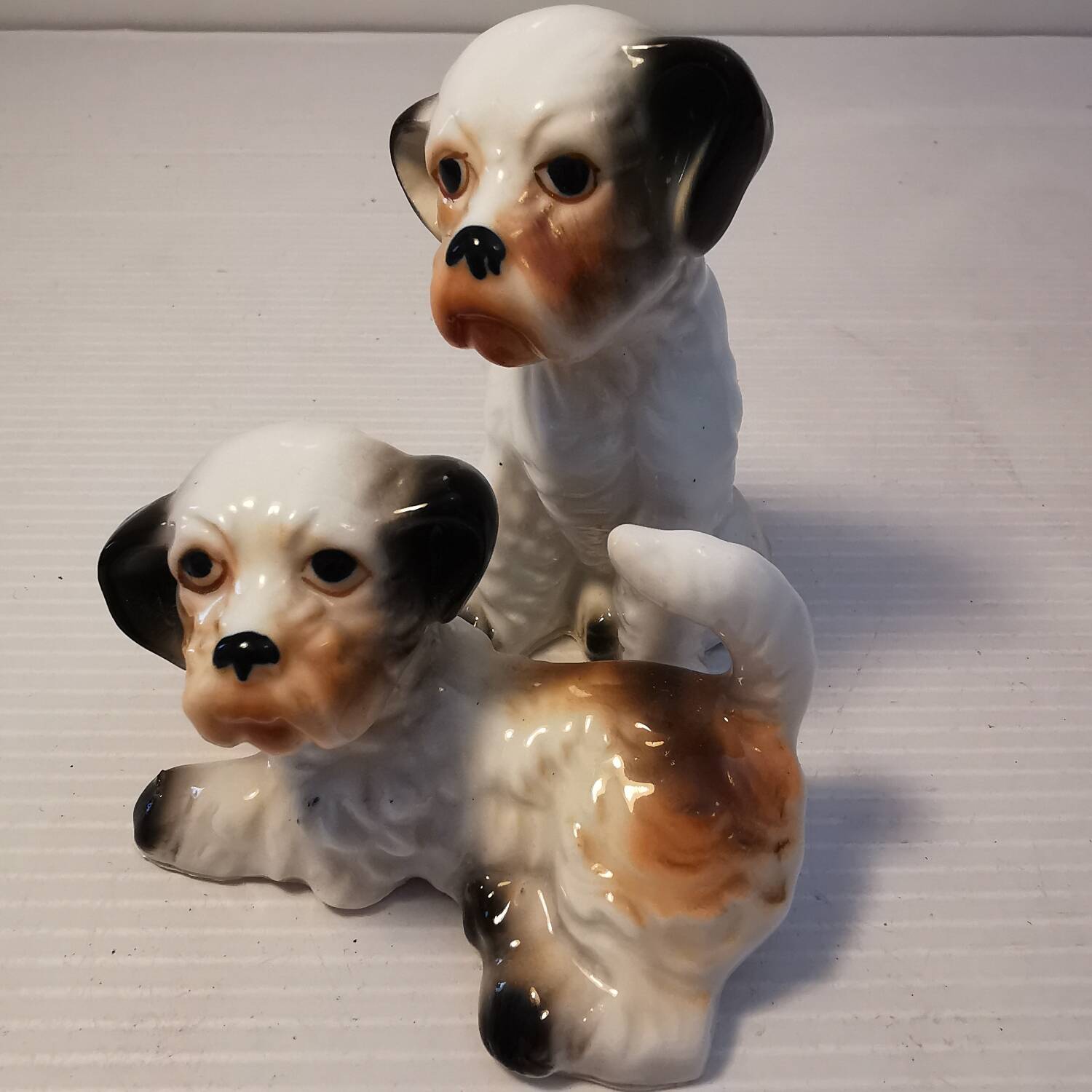 Pair of vintage ceramic terrier puppy dog figurines