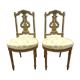 Paire de chaises de style Louis XVI en bois doré XX siècle