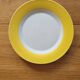 7 yellow and white dessert plates