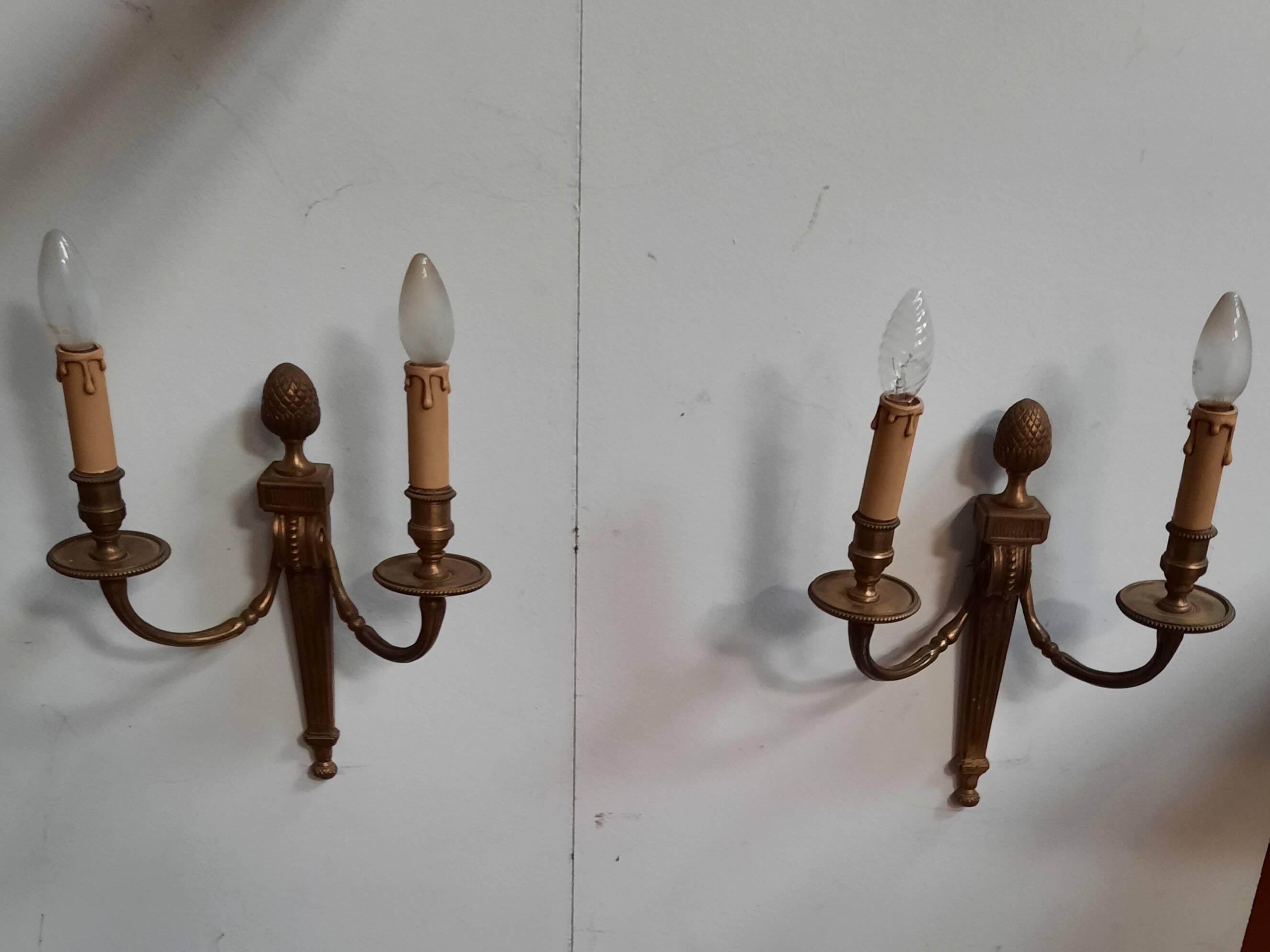 Pair of Louis XVI style bronze wall lights