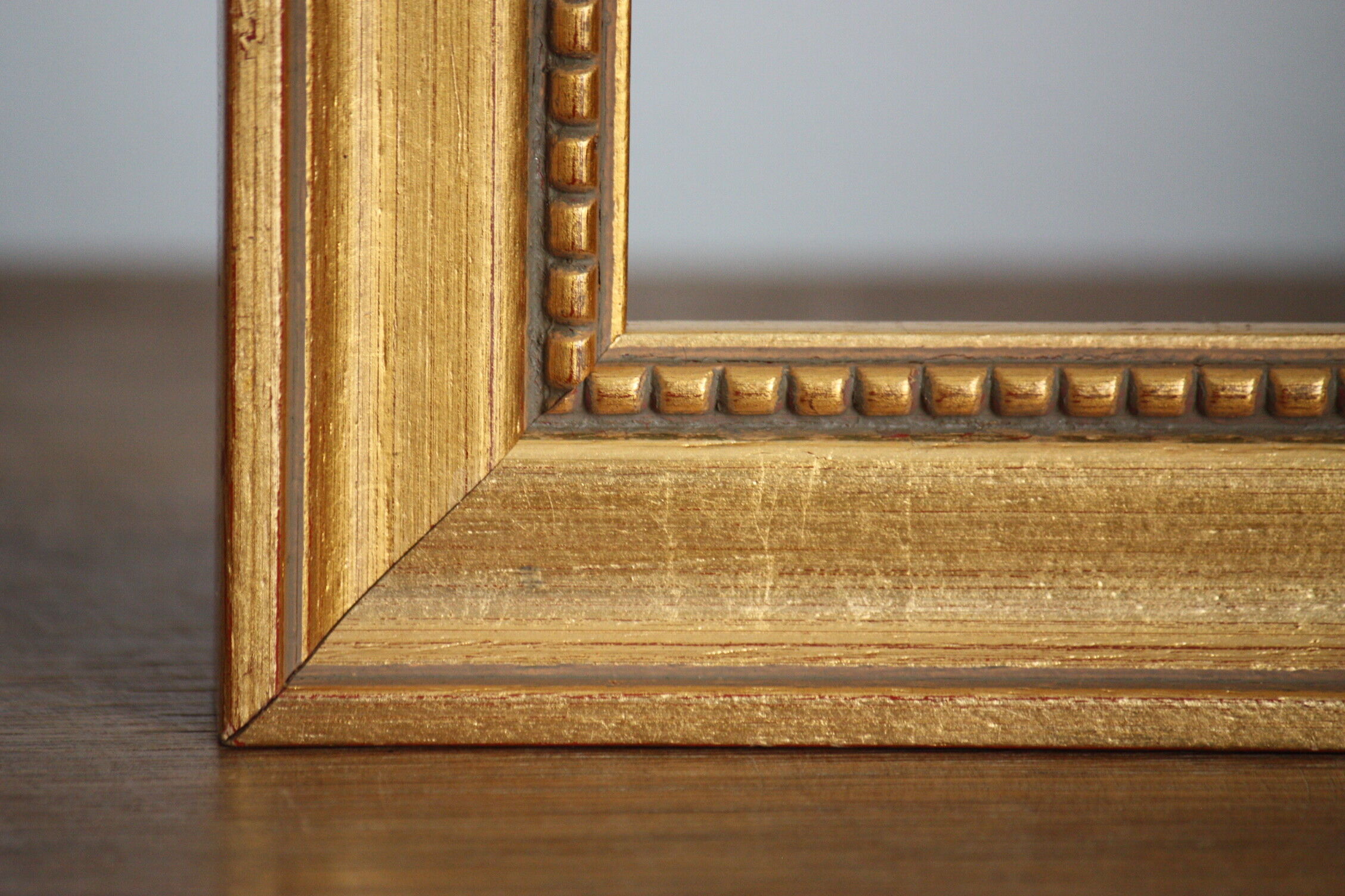 Carved and moulded gilded wood frame