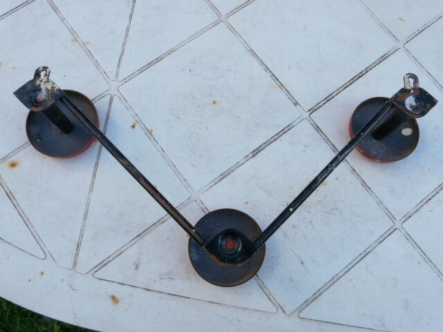 Vintage black and red metal wall coat rack