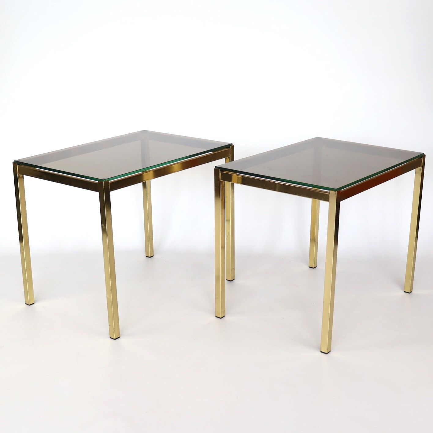 Pair of gilded metal side tables