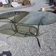 Silver metal table with smoked glass top from the 1970s.