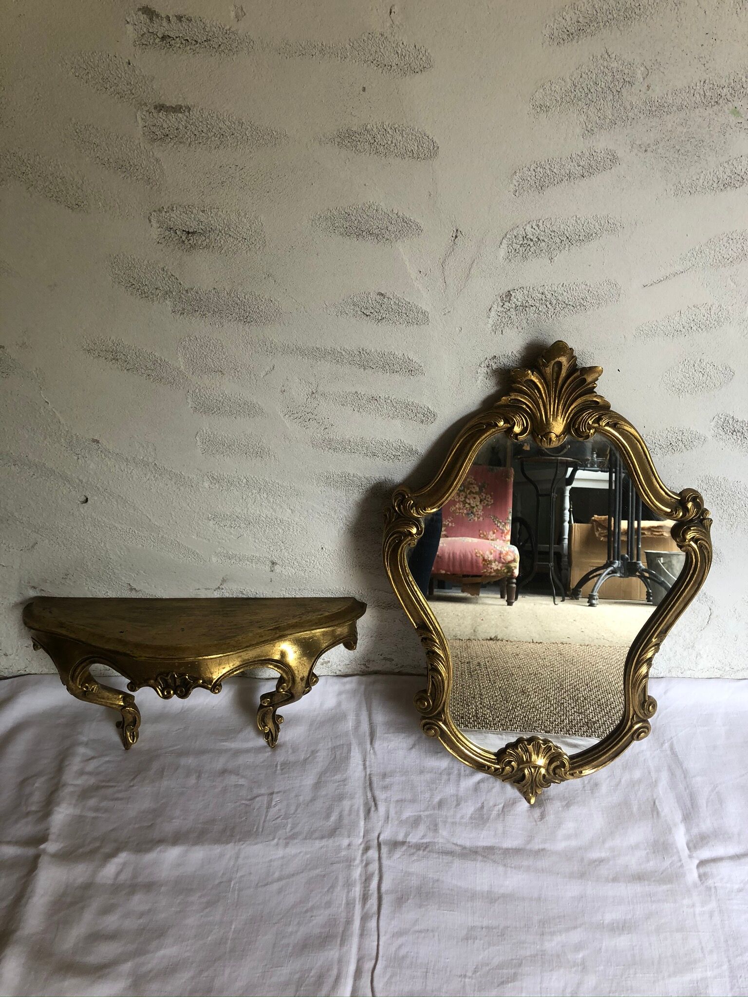 Old golden mirror and console