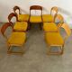 Set of 7 Baumann sled chairs in wood and mustard yellow fabric, 1960s