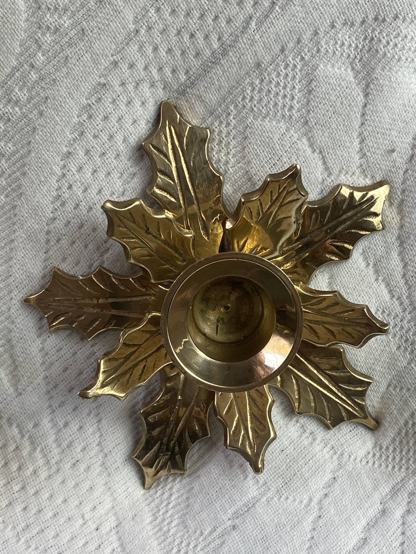 Pair of candlesticks, holly leaves, in brass