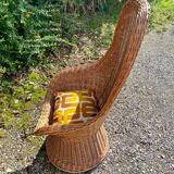 Rattan armchair and its cushion, 1960