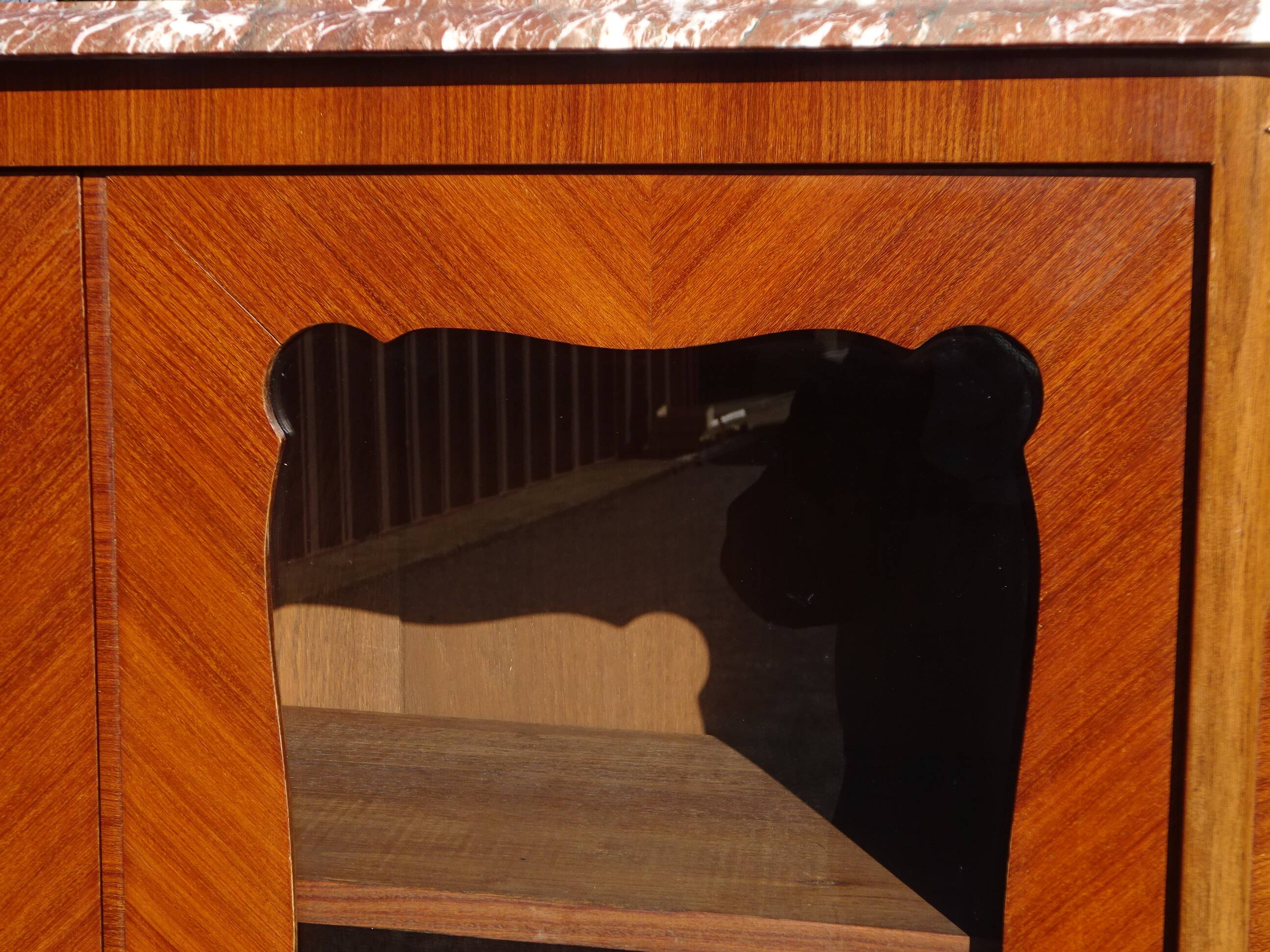 Glass library with rosewood marquetry in the Louis XV style.