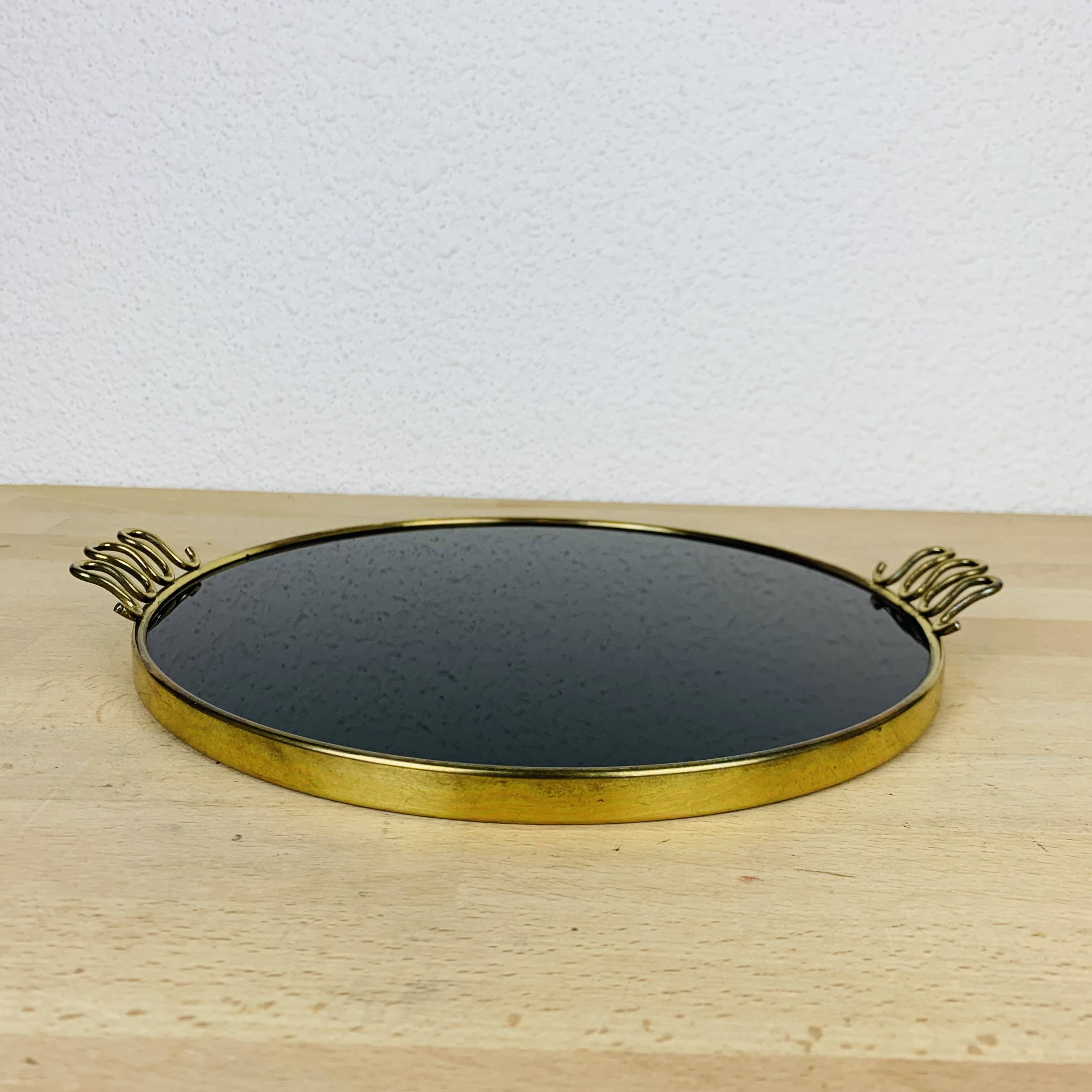 Black and golden brass tray from the 1950s