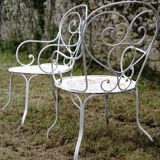 Duo of wrought iron armchairs