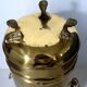 Hollywood Regency style umbrella stand, brass finish and lio pattern.
