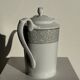 Bavarian porcelain teapot from Germany with blue frieze and flower lid H23