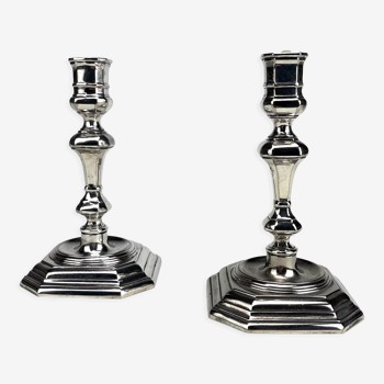 Pair of antique candlesticks in silver metal