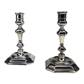 Pair of antique candlesticks in silver metal