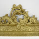 Old wall mirror in wood and gilded stucco, Louis XVI style. XIXth