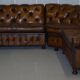 Vintage Chesterfield corner sofa in hand-dyed leather with solid walnut feet.
