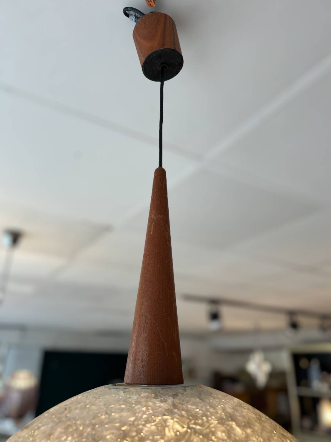 Resin and teak ball pendant light